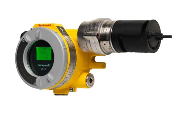 The Optima Excel Local Display, a yellow and black electronic device, showcases a bright green light.