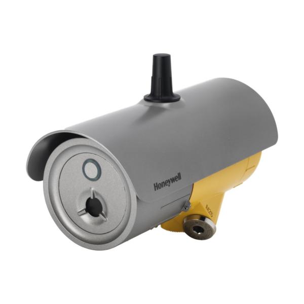 A yellow and gray security camera mounted on a wall, labeled 